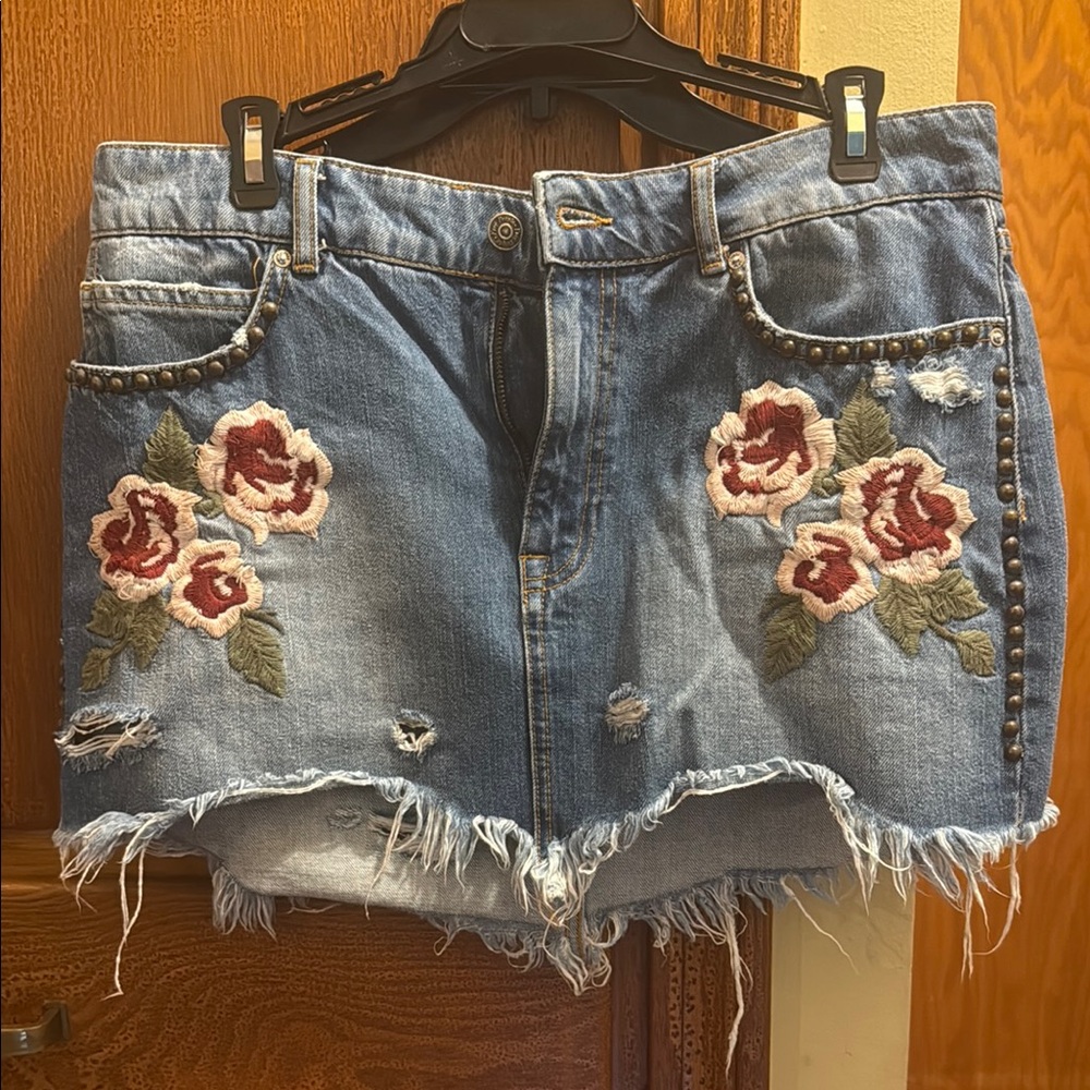 Free People Blue Denim Skirt with flower embroidery and subtle stud details